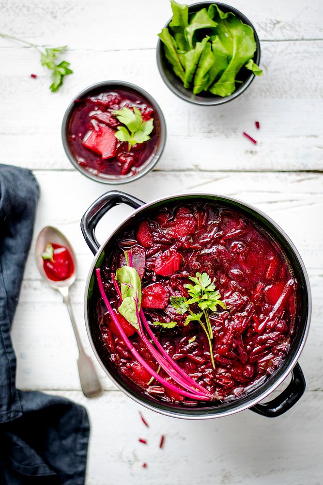 Homemade beetroot soup in a pot flatlay. Visit Monika Grabkowska to see more of her food photography.