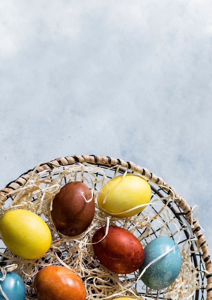 Colored Easter eggs in a basket. Visit Monika Grabkowska to see more of her food photography.