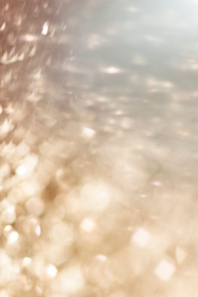 Blurry golden glitter background texture