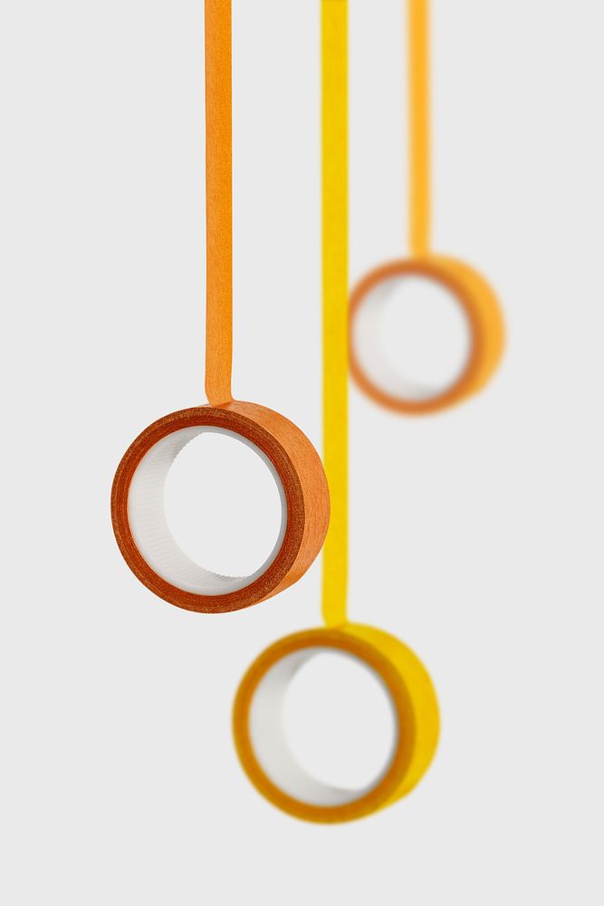 Yellow and orange rolls of tape design resources