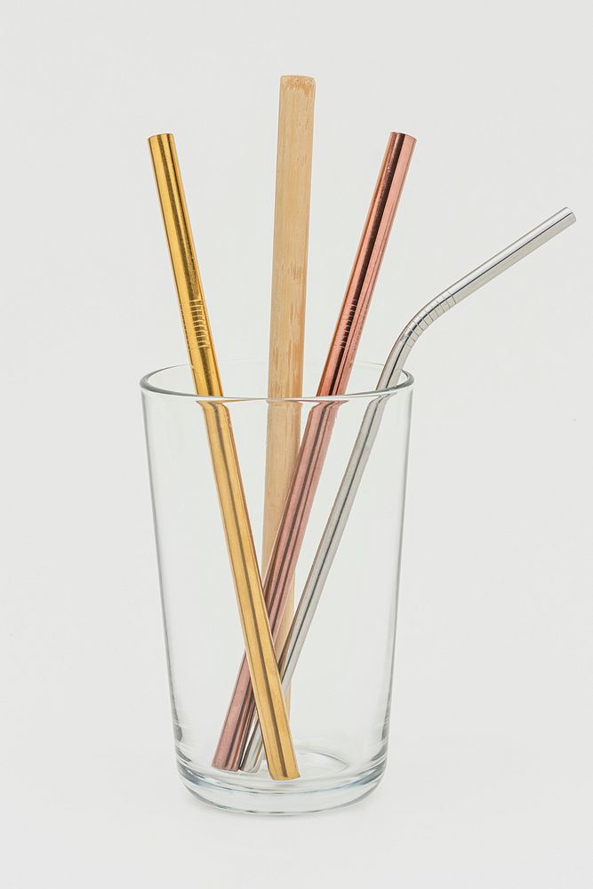 Set of reusable straws in a glass