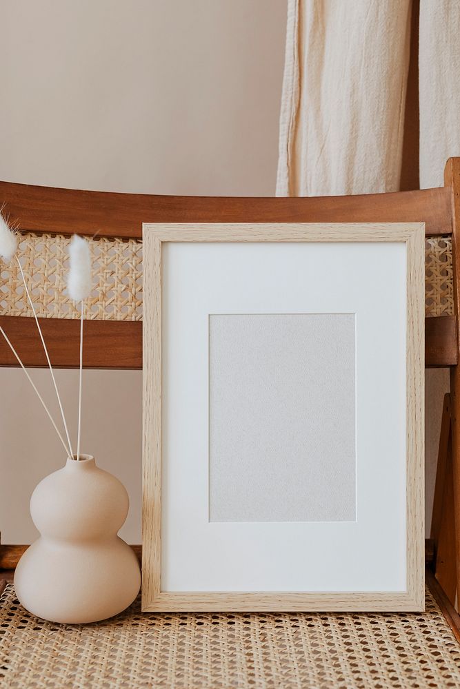 Rectangle wooden photo frame on a chair