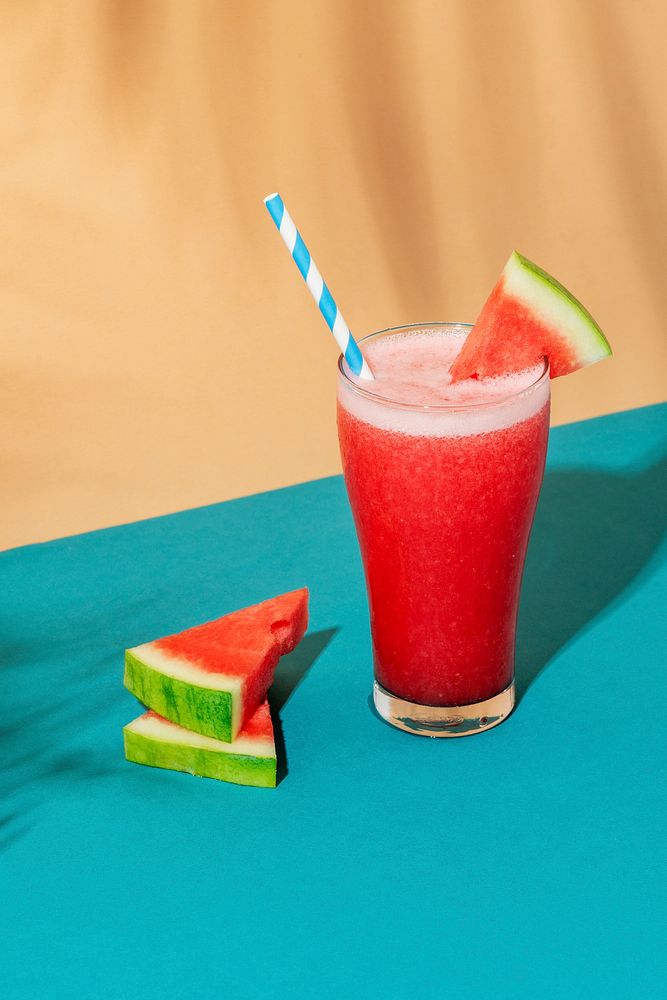 Fresh watermelon smoothie on colorful background