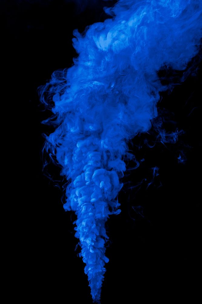 Blue smoke effect design element on a black background