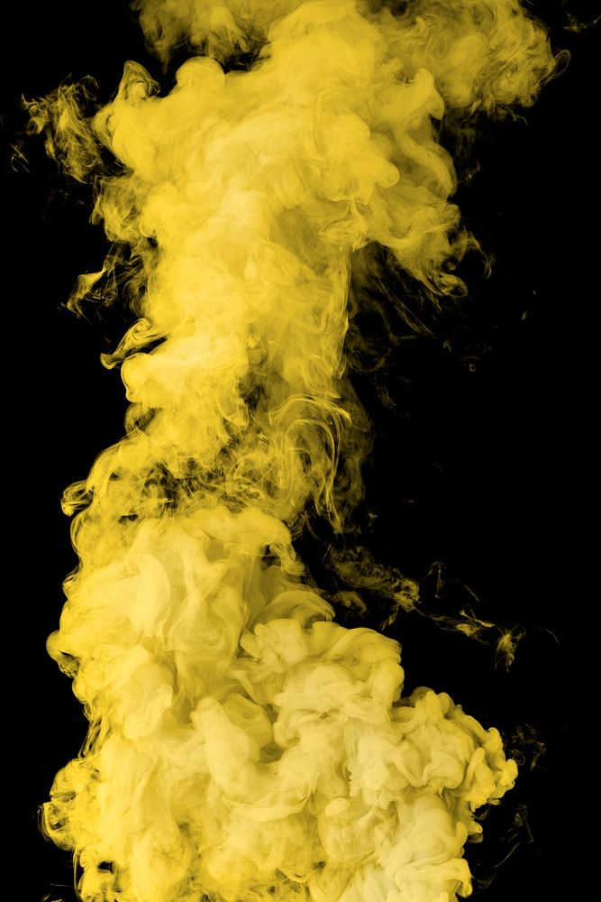 Yellow smoke effect design element on a black background