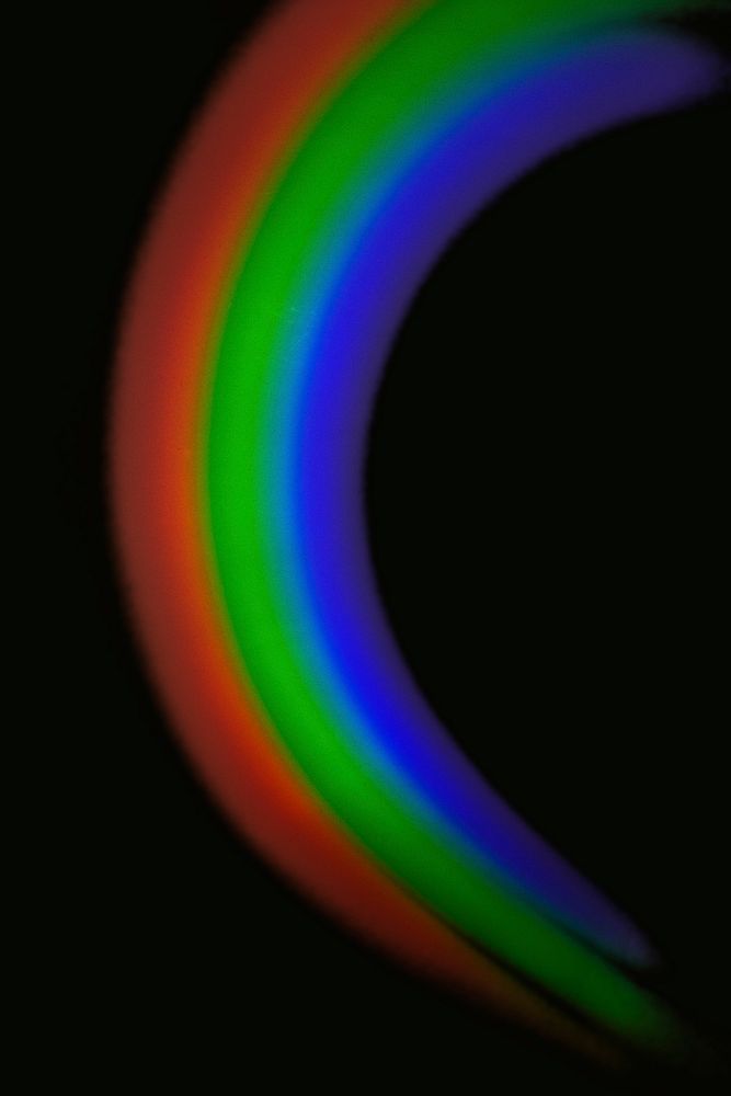 Semicircle light leak effect on a black background