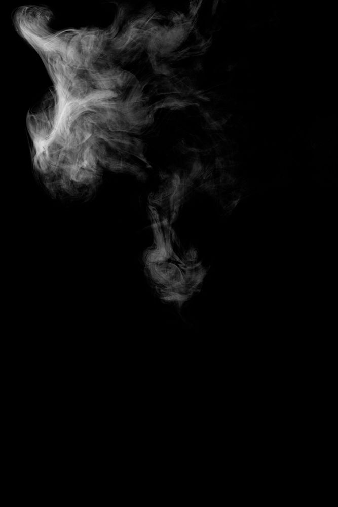 White smoke effect on a black background