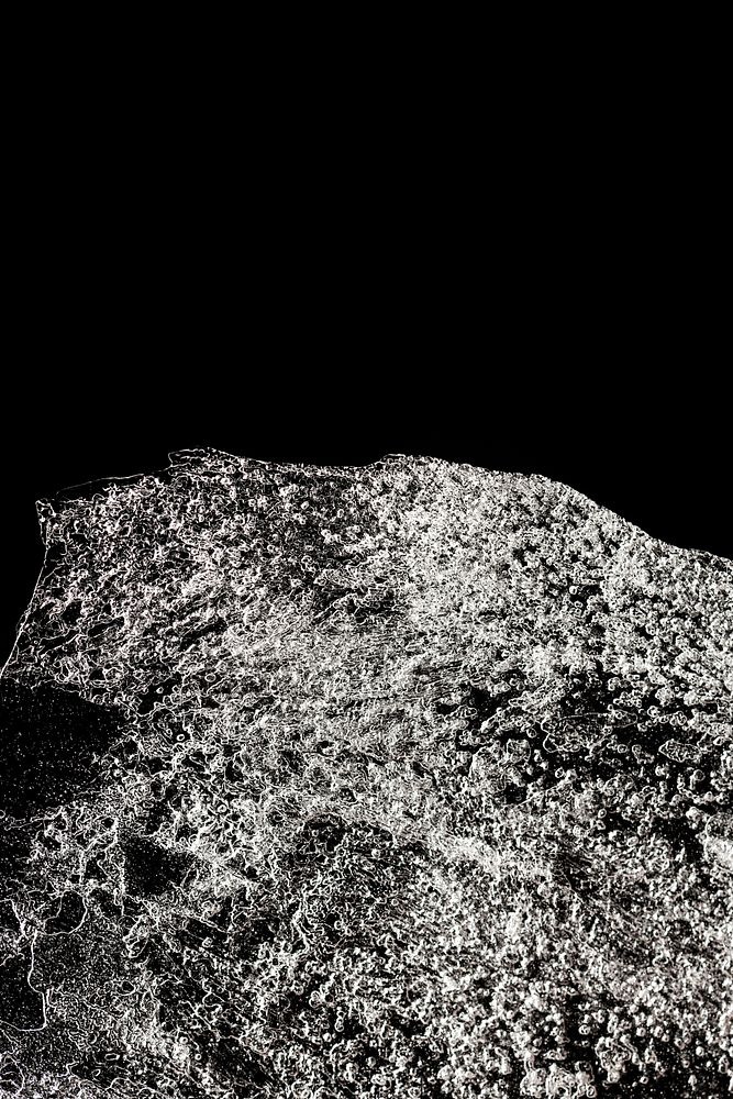Ice surface texture macro shot on a dark background