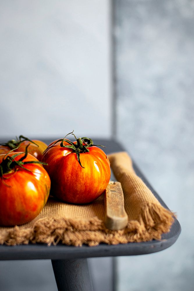 Natural fresh organic tomatoes on a table