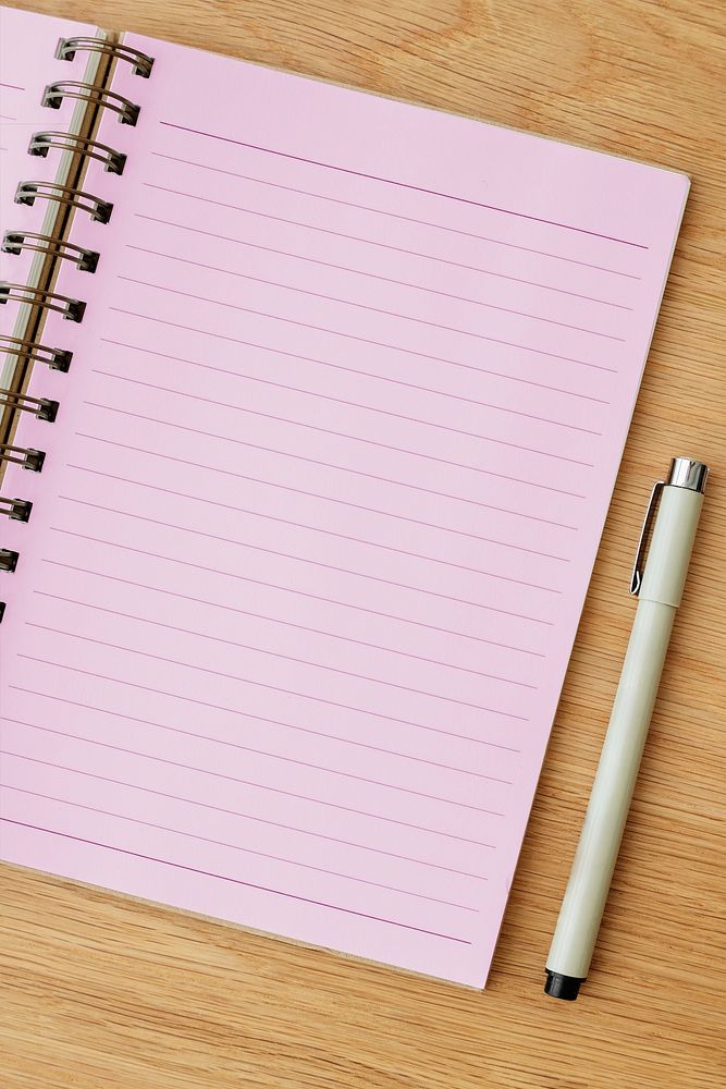 Blank plain pink notebook page with a pen mockup