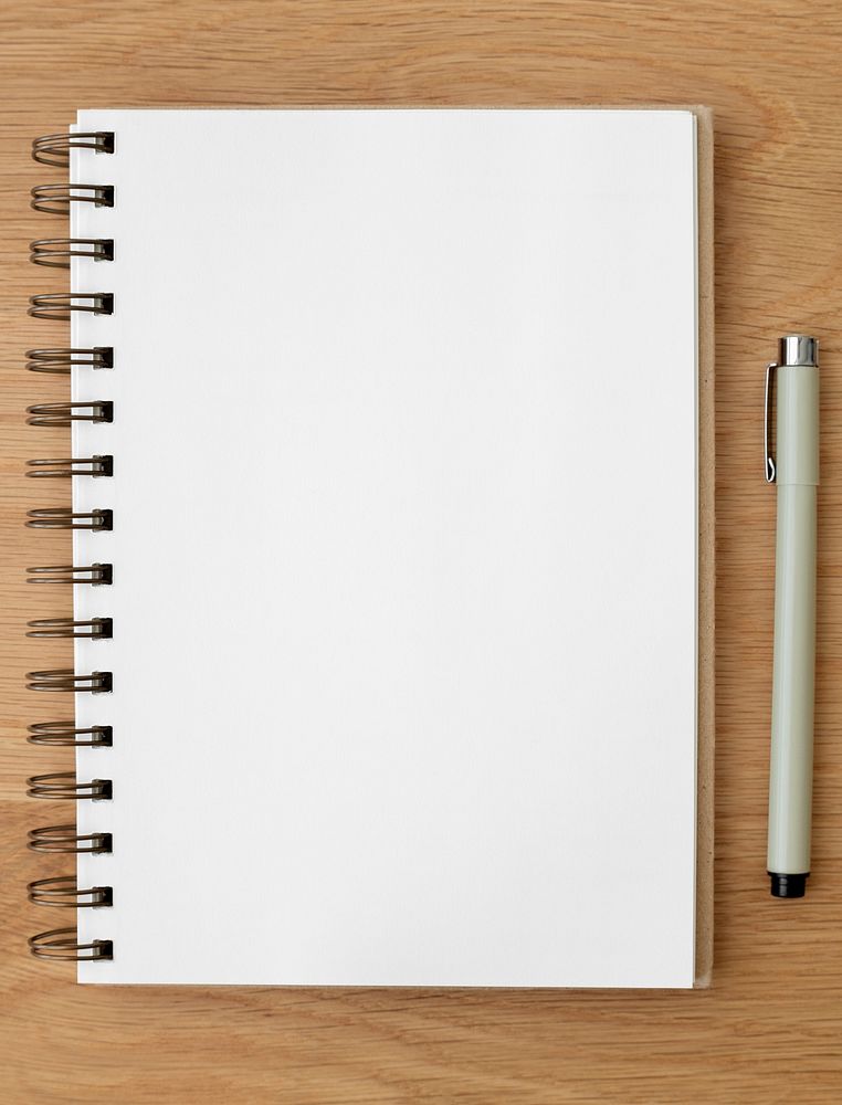 Blank plain white notebook page with a pen