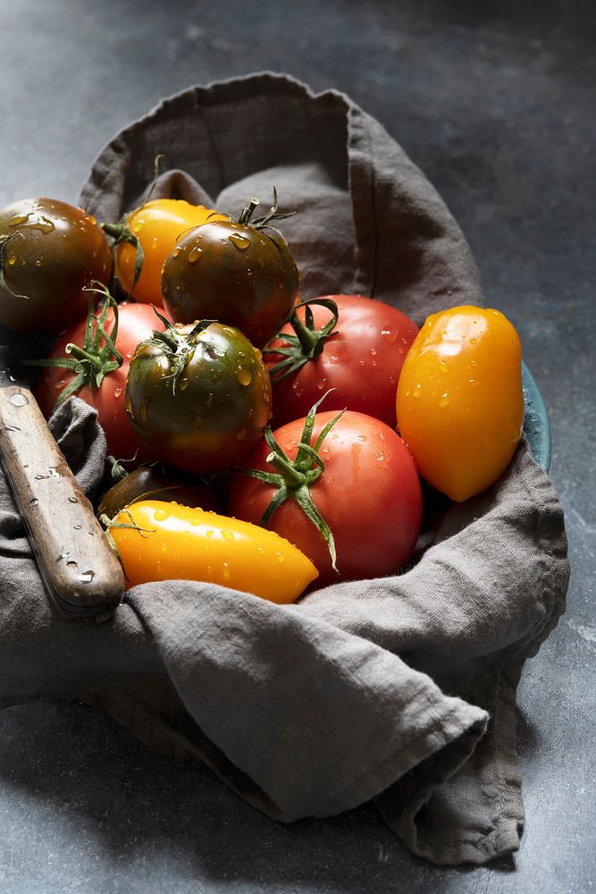Organic tomatoes vegetable in a sack flat lay