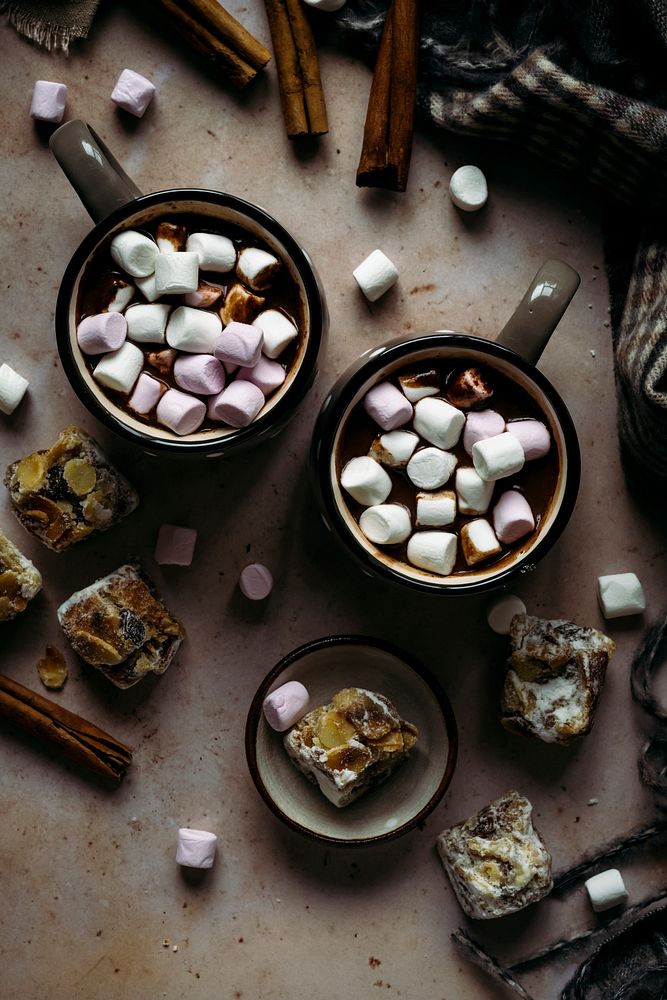 Marshmallows dipped in hot chocolate flat lay Christmas food photography