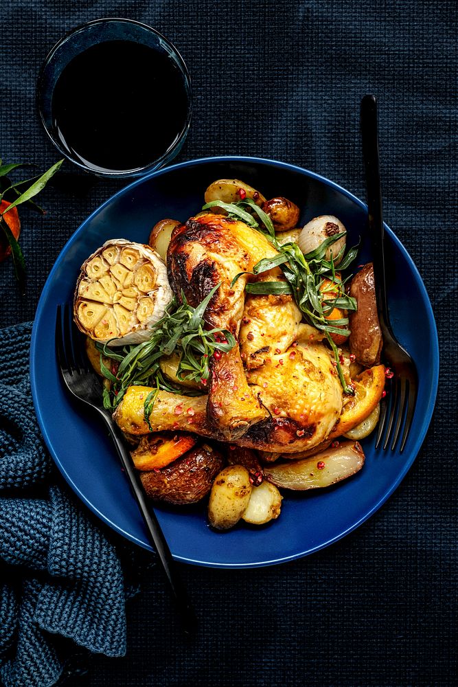 Roasted chicken with potatoes holiday dinner food photography