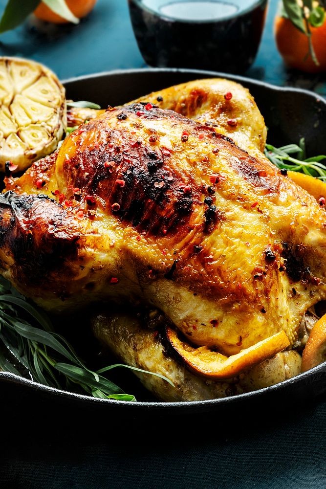 Roasted chicken with potatoes holiday dinner food photography