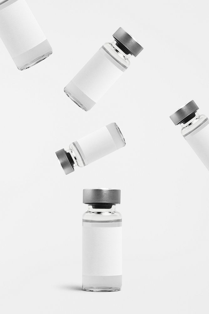 Falling injection glass bottles psd with white label mockup