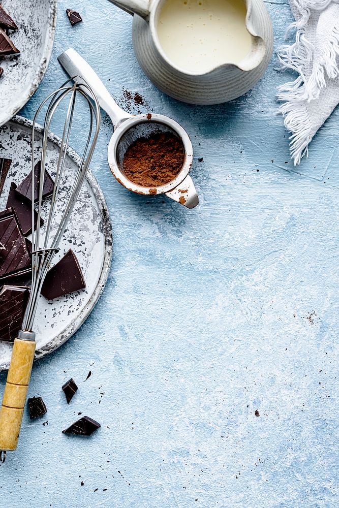 Chocolate ganache truffle ingredients in a kitchen flat lay 