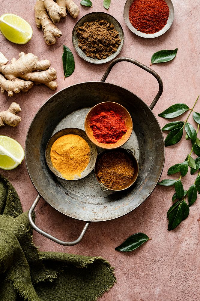 Curry spice ingredients butter chicken on a tray food photography flat lay