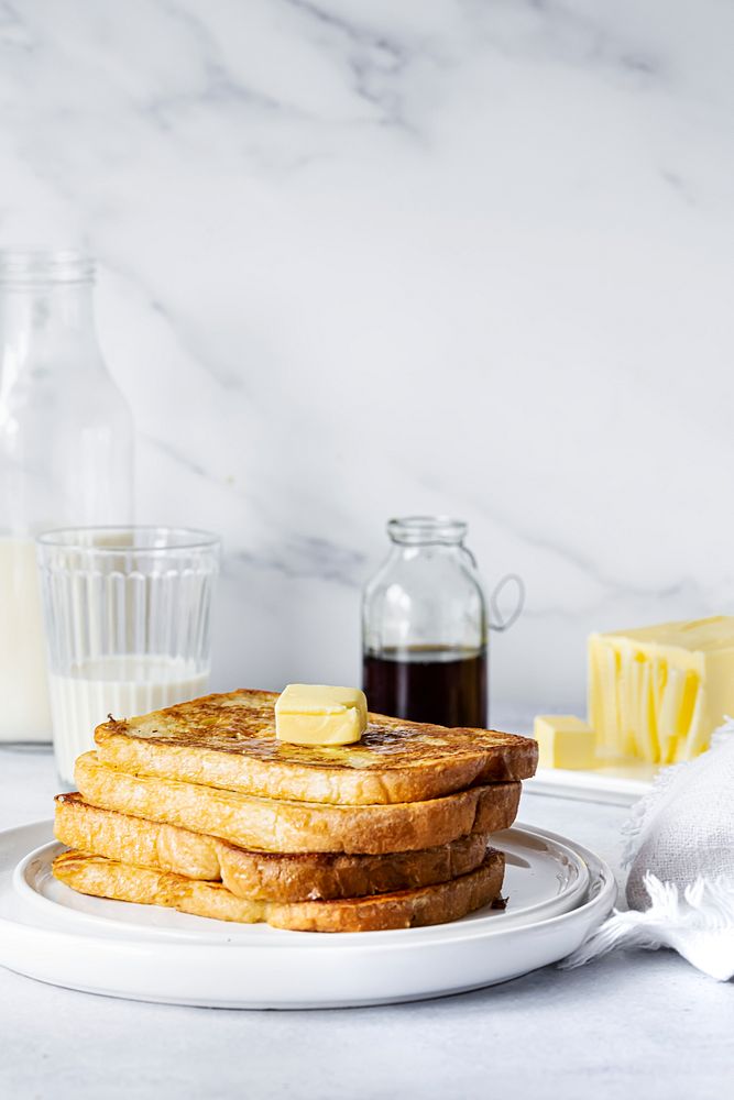 French toast breakfast with butter on top food photography