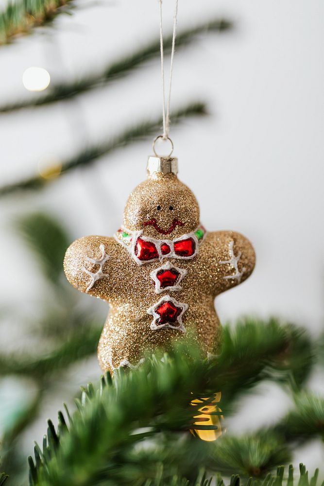 Gold gingerbread man on a Christmas tree