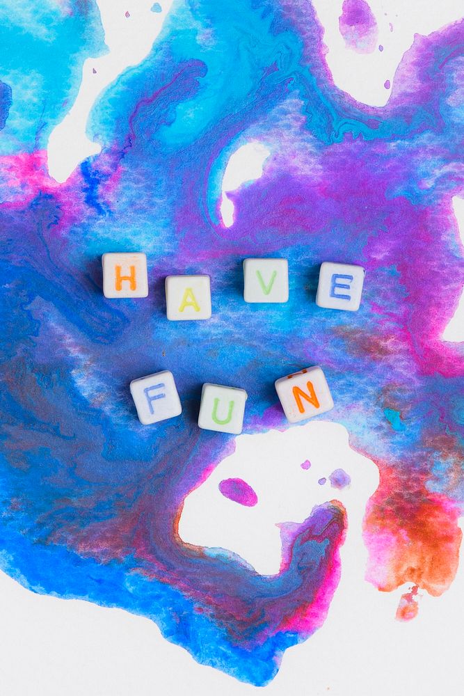 HAVE FUN beads message typography on abstract background