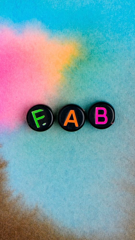 Black FAB beads text typography on