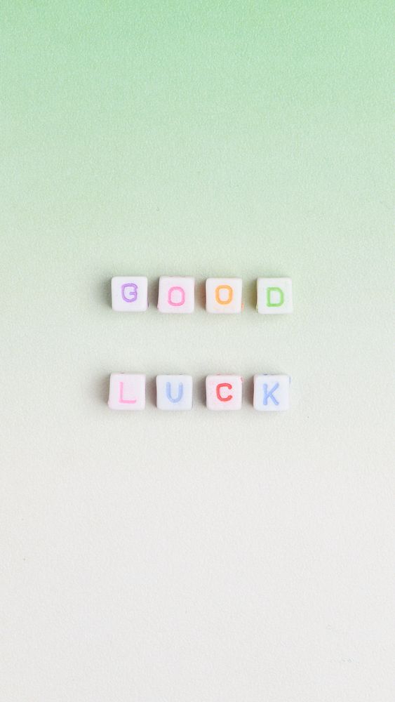 GOOD LUCK beads word typography on green