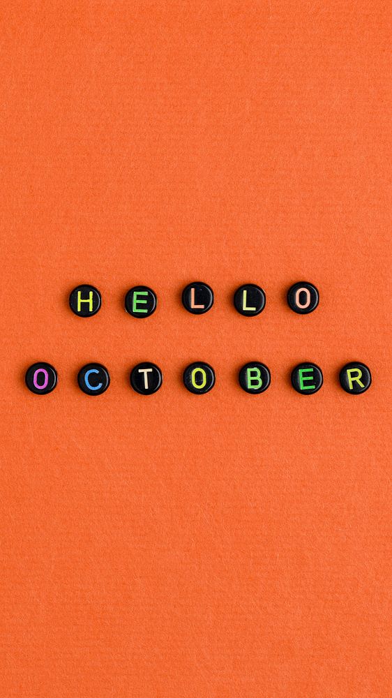 HELLO OCTOBER beads word typography on orange
