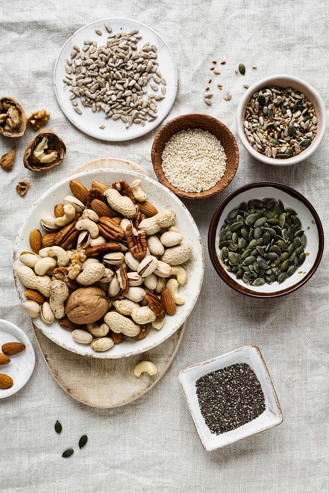 Nuts in cups healthy food flat lay