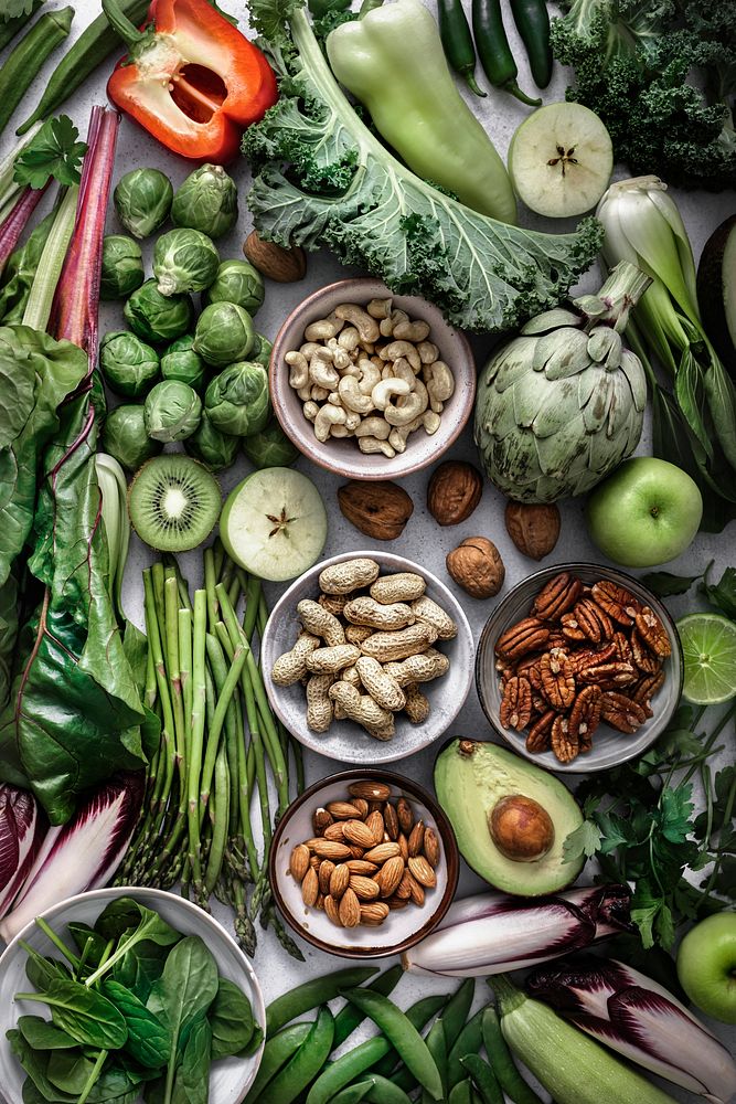 Green vegetables with mixed nuts flat lay healthy lifestyle