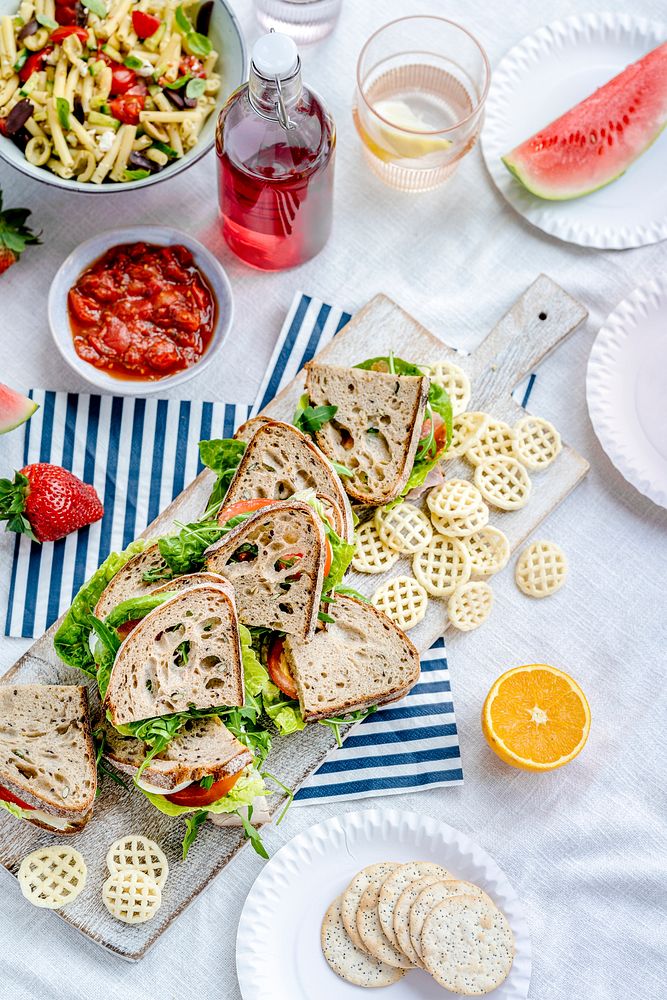 Picnic wholewheat sandwiches on a cutting board