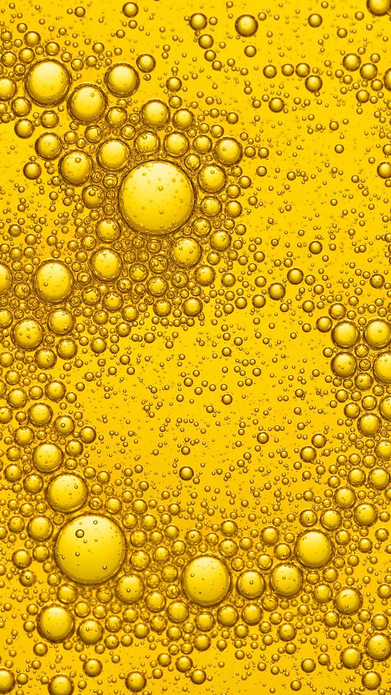 Yellow mobile wallpaper oil bubble in water background