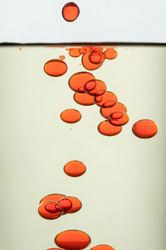 Abstract background orange oil bubble in water wallpaper
