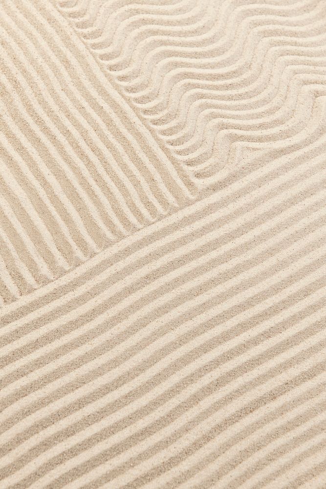 Striped zen sand background in health and wellbeing concept