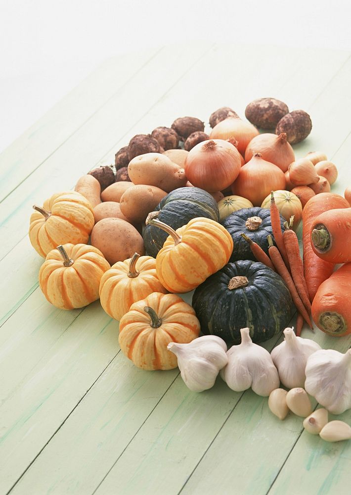 Top View Of Squash And Pumpkins On Wooden Floor