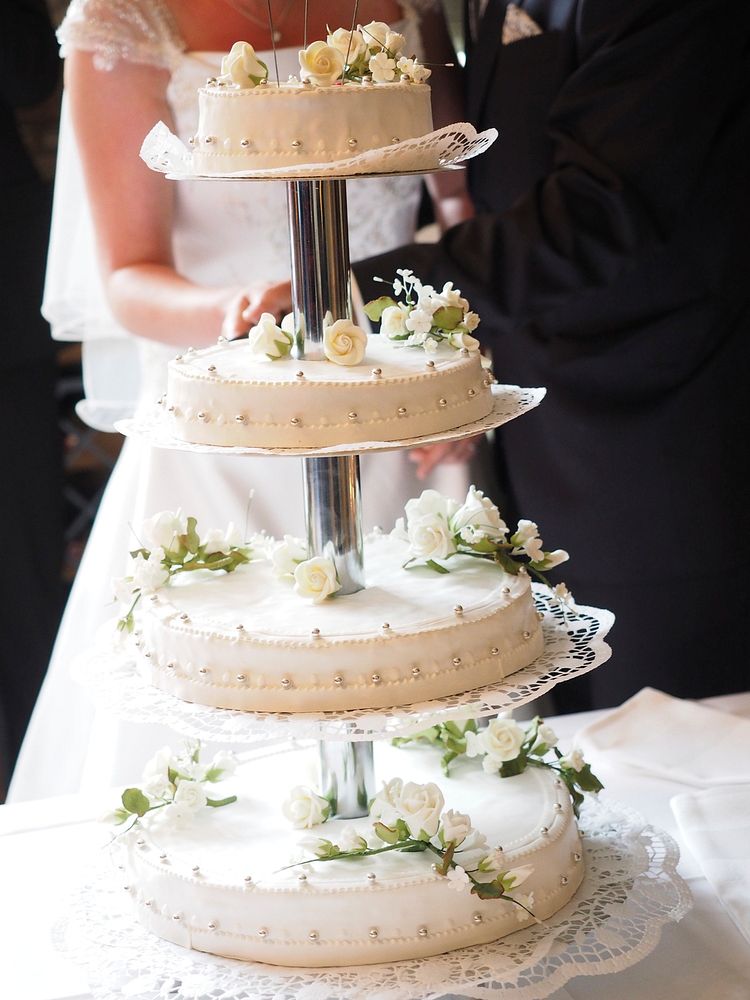 Free bride and groom cutting cake image, public domain CC0 photo.