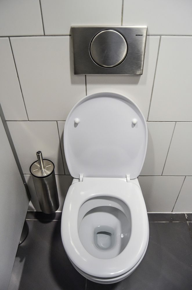 Free open toilet seat in bathroom image, public domain CC0 photo.