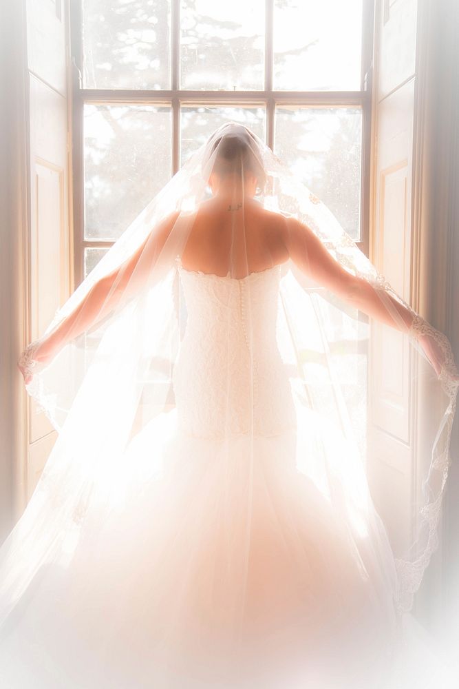 Bride standing by the window, free public domain CC0.