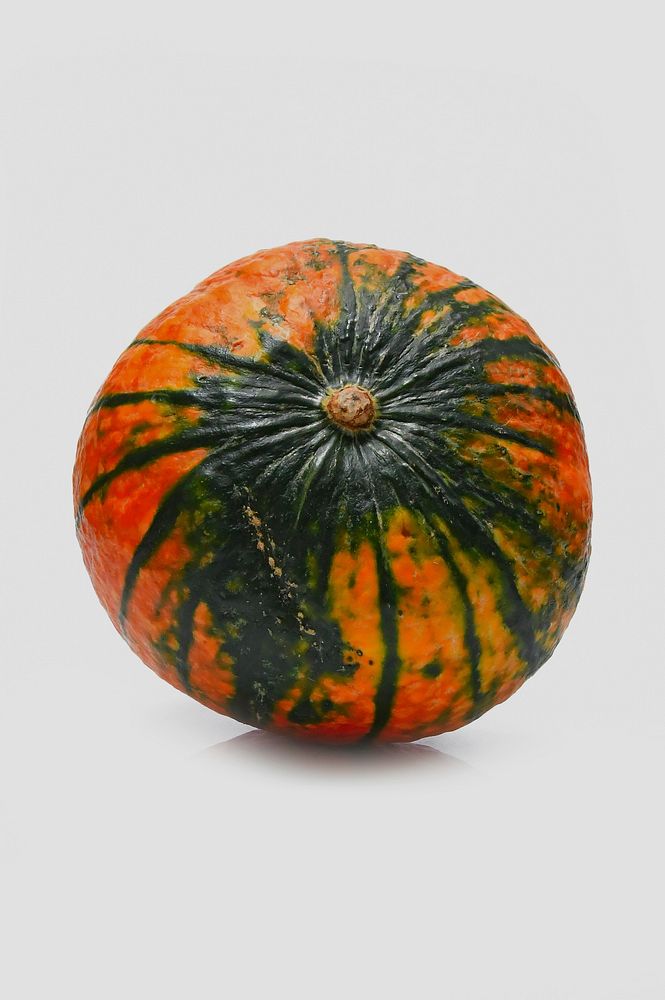 Free orange with green stripes pumpkin closeup image, public domain CC0 photo.