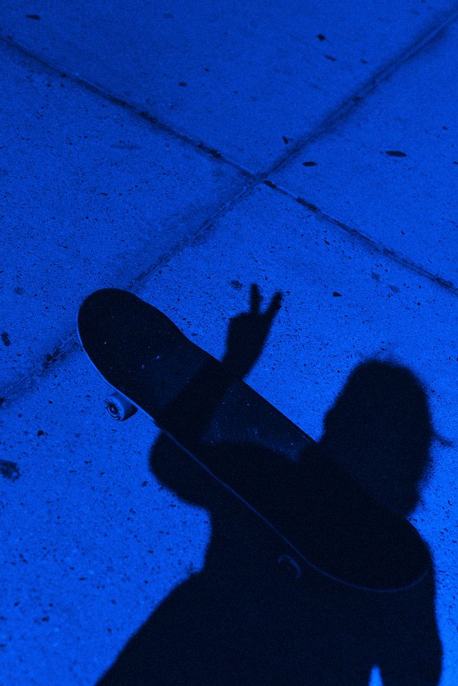 Neon blue shadow aesthetic, skateboard on the street