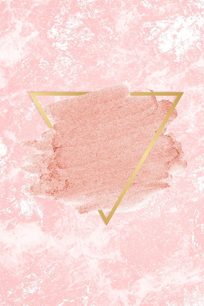 Pastel pink paint with a gold triangle frame on a pastel pink  background