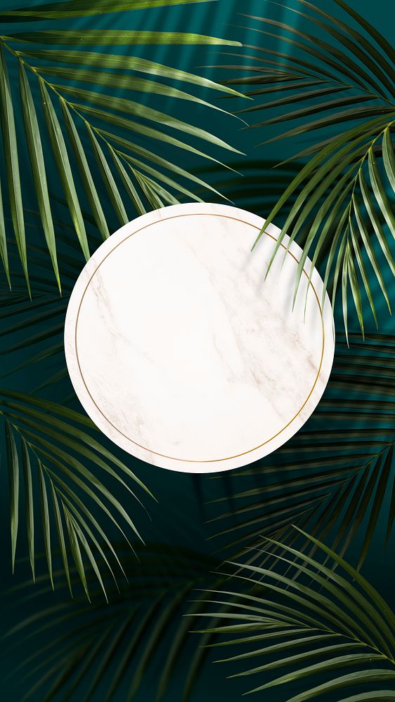 Round golden frame on a tropical background