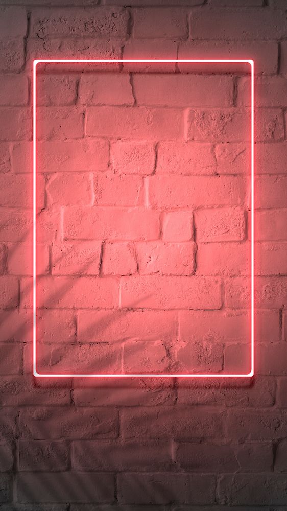 Neon red frame on a brick wall