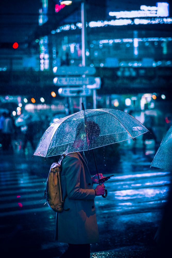 Salaryman with umbrella in Tokyo, Japan