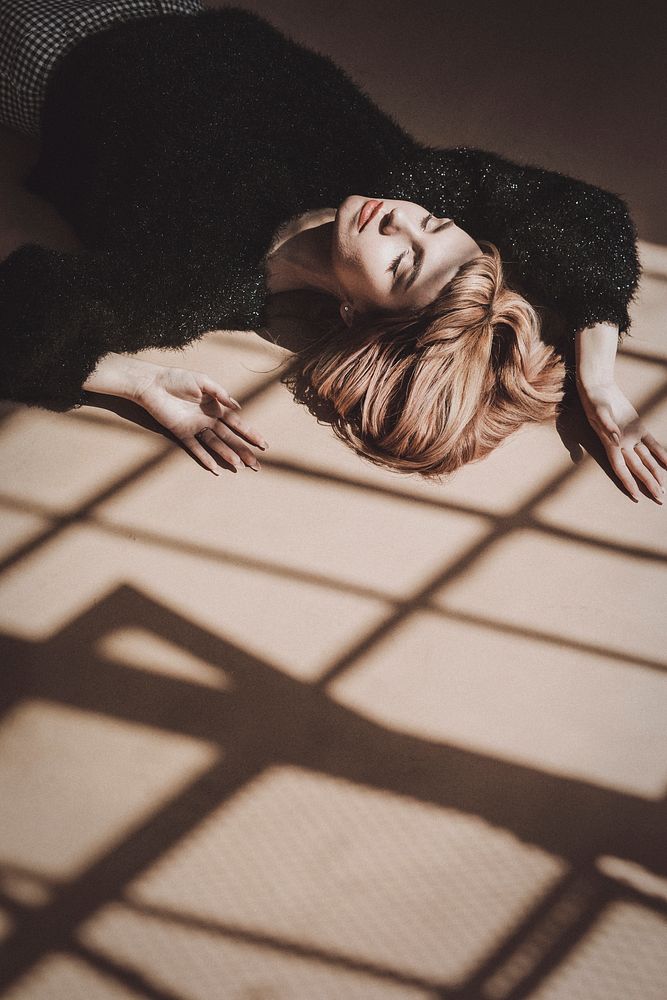 Beautiful woman lying on a floor