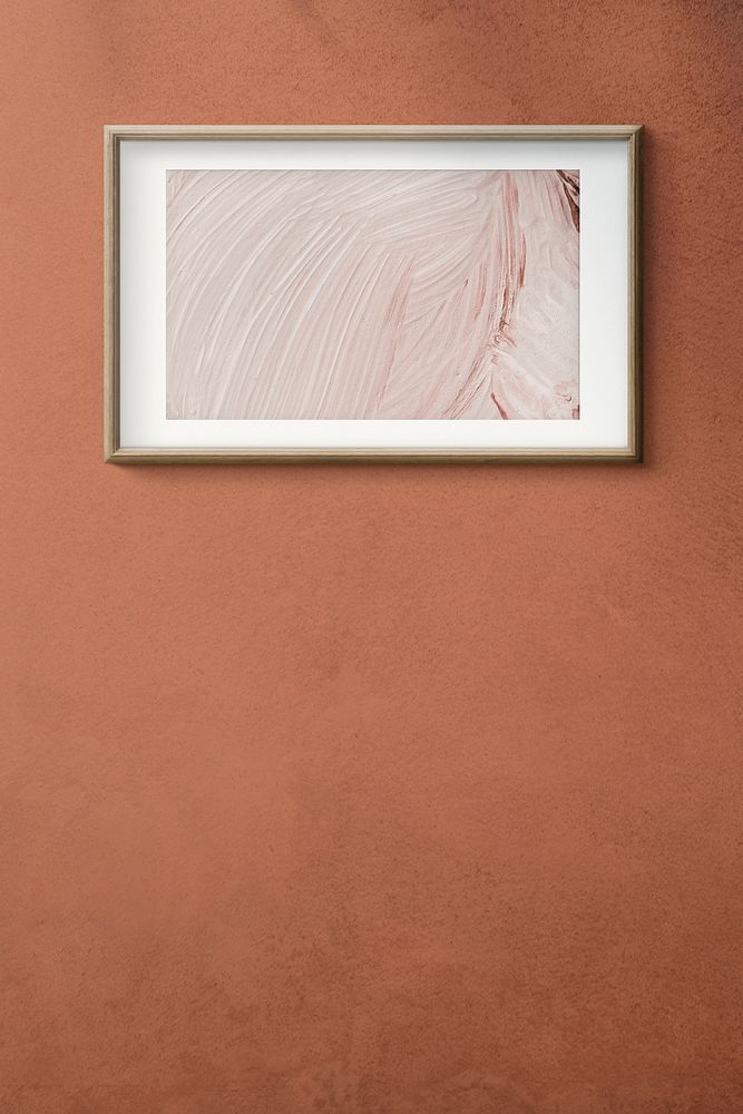 Wooden picture frame hanging on an orane wall illustration