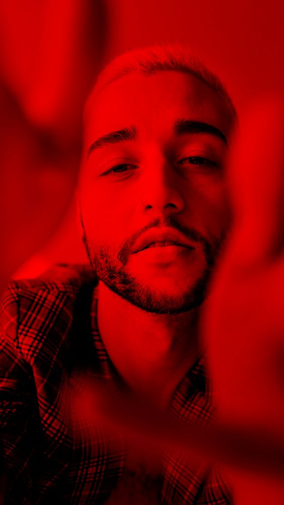 Man seducing face expression red Premium Photo rawpixel