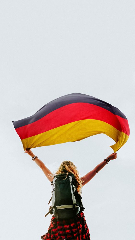 Woman holding the German flag