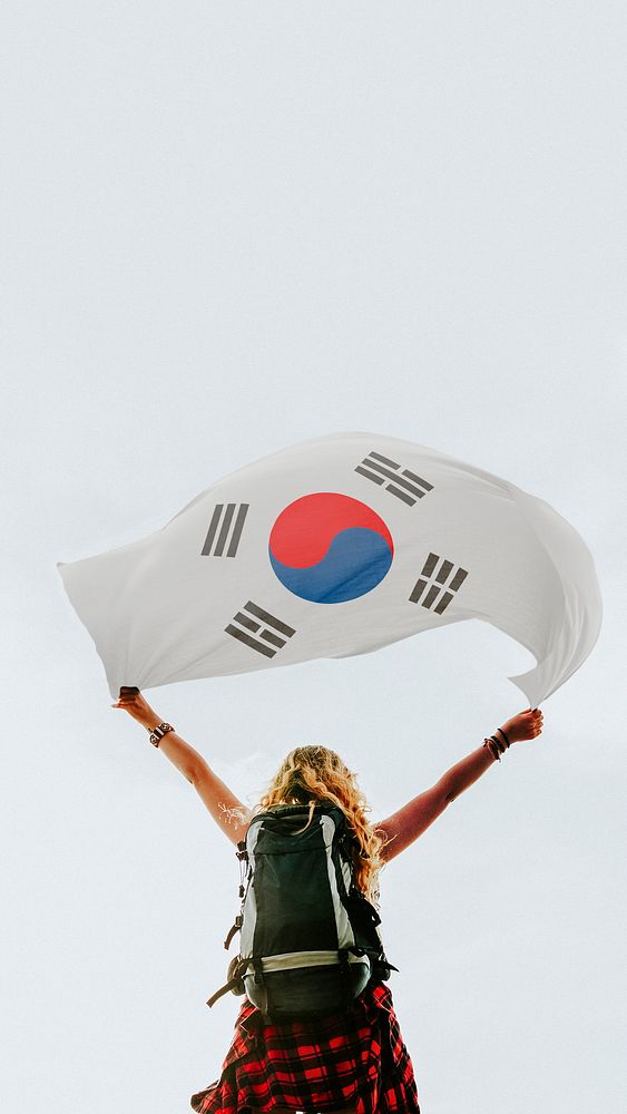 Woman holding the South Korean flag mobile wallpaper