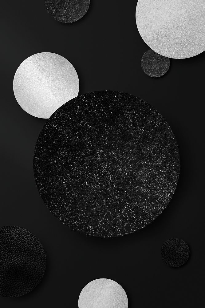 Shimmery black and silver round pattern background vector